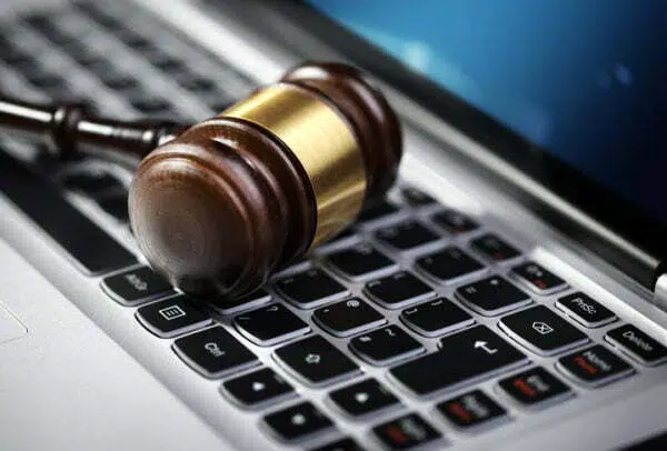 Justice gavel and laptop computer keyboard