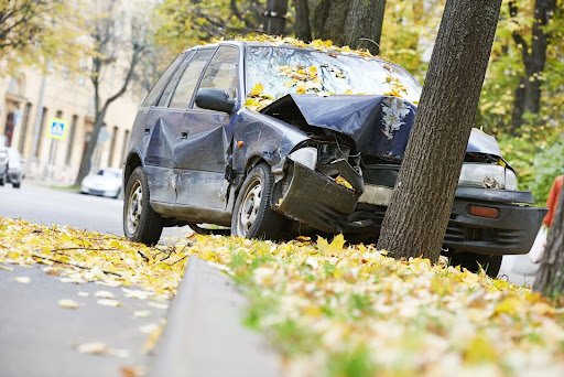 Damaged vehicle after a roadway collision, illustrating the severity of Washington car wrecks and the risks that contribute to statewide injury and fatality statistics.